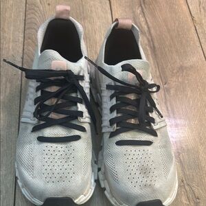 Black and Pink Sneakers with Breathable Mesh and Sleek Design